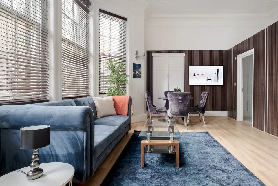 Living area with a velvet sofa