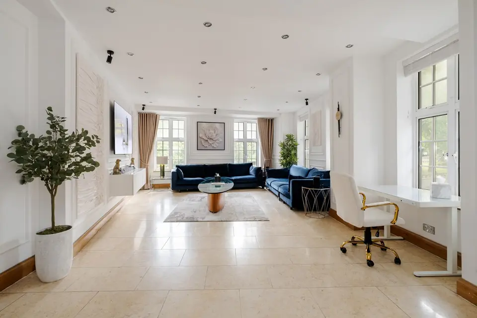 Drawing room with a writing desk by the window