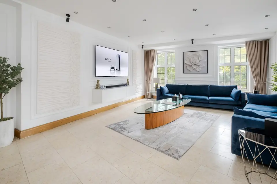 Drawing room with navy velvet sofas