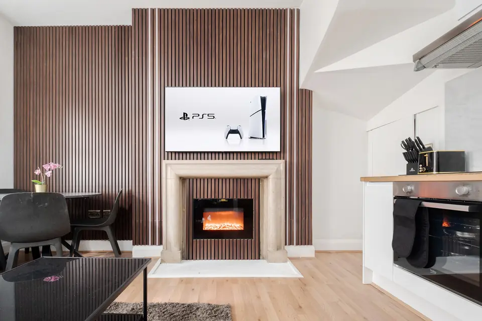 Fireplace beneath the smart television